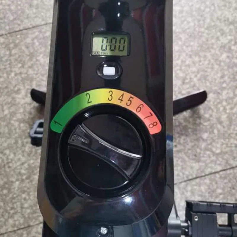 Black upright magnetic control exercise bike with table for small household fitness and home cycling workouts