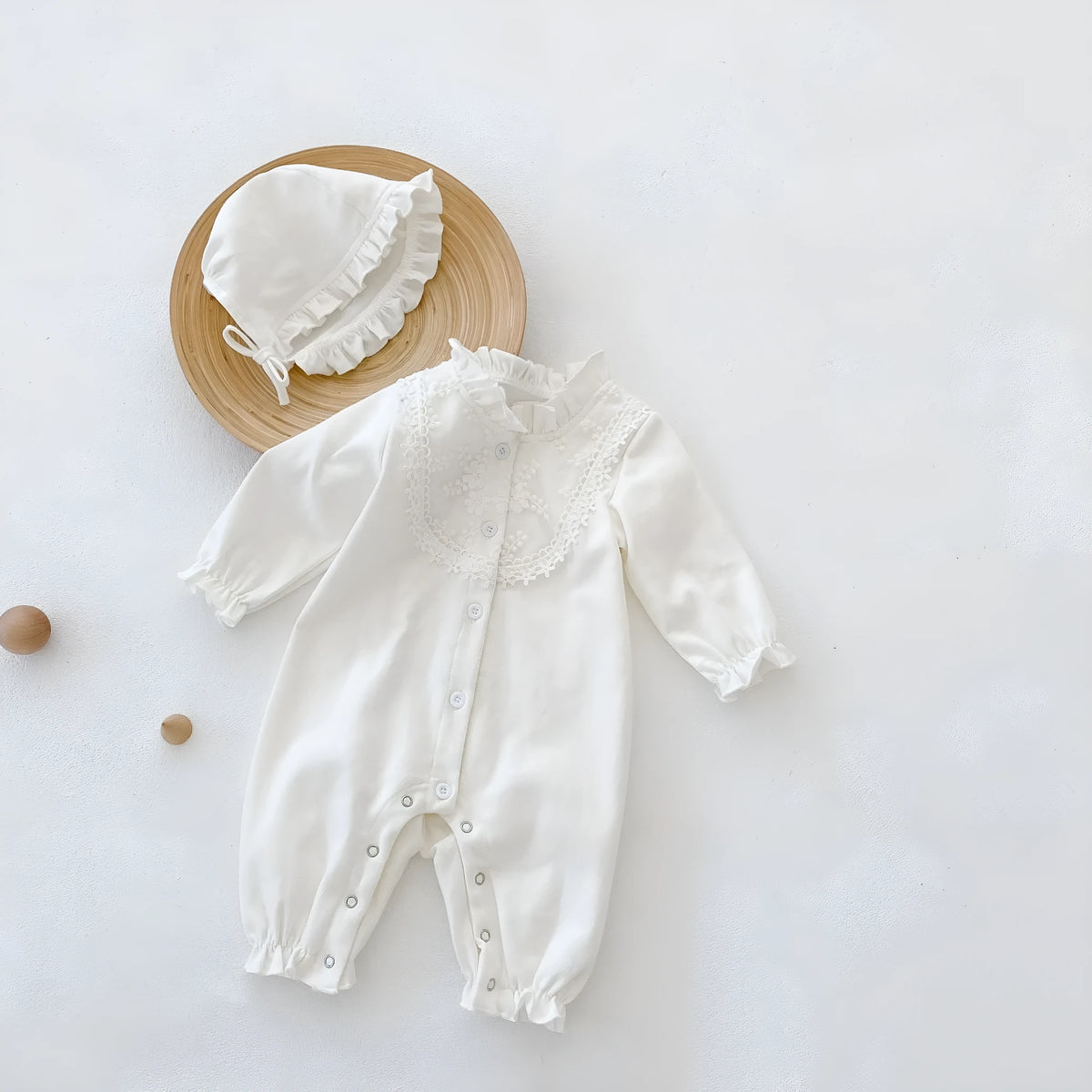 Beige knitted cotton hooded jumpsuit with wooden ear collar and lace, long sleeve, for baby and toddler autumn wear.