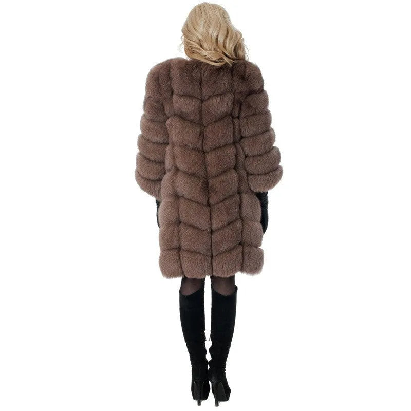 Women's long artificial fur coat in dark camel colour with regular sleeves.