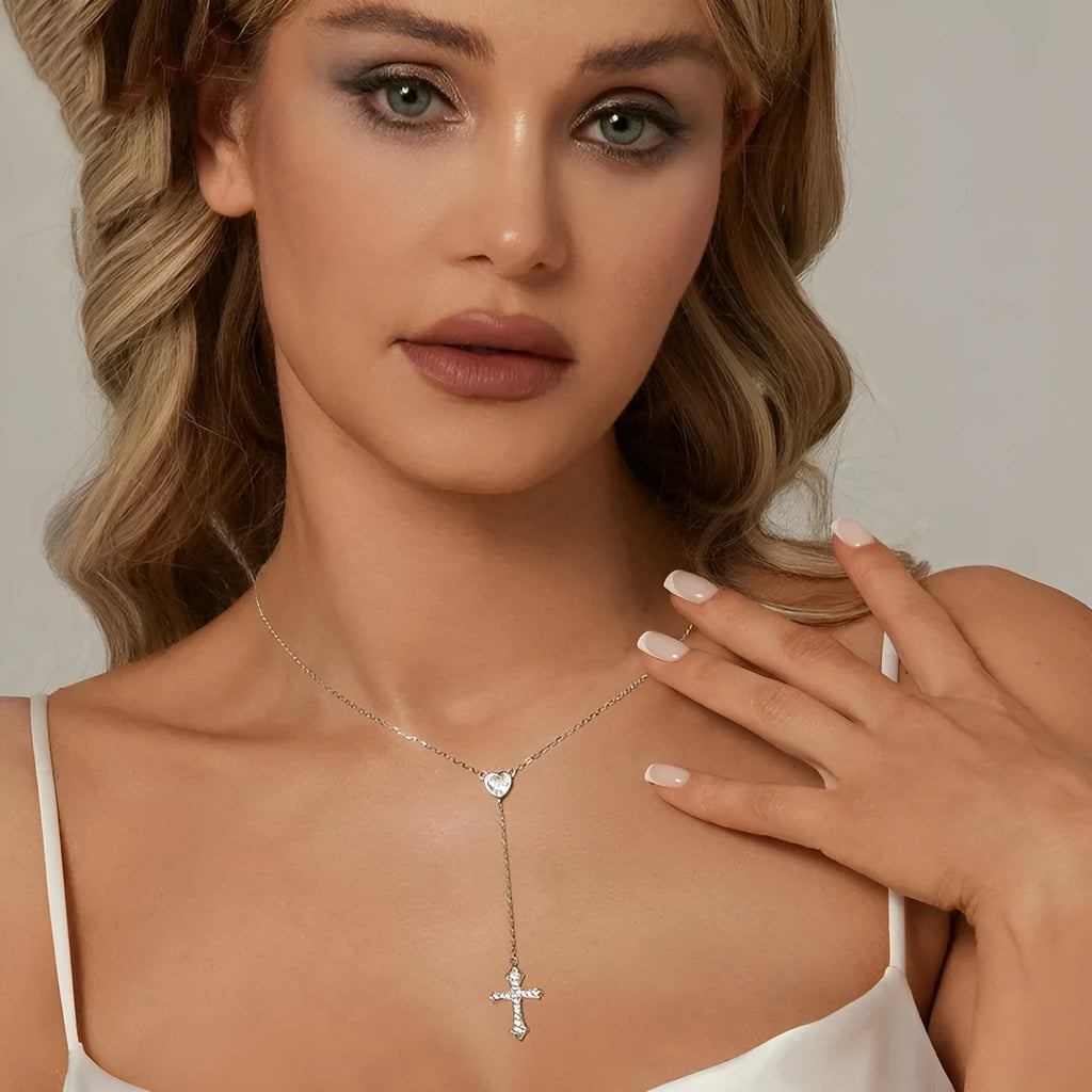 Simple silver cross necklace with V-neck and O-ring chain in colour BSN384.