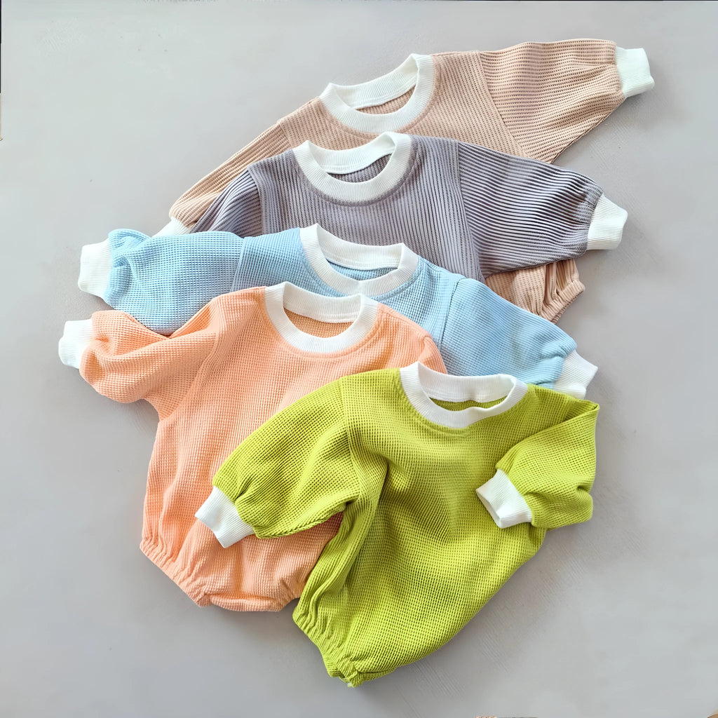 Baby waffle cotton loose triangle jumpsuit bodysuit in coral with hidden hook closure long sleeves