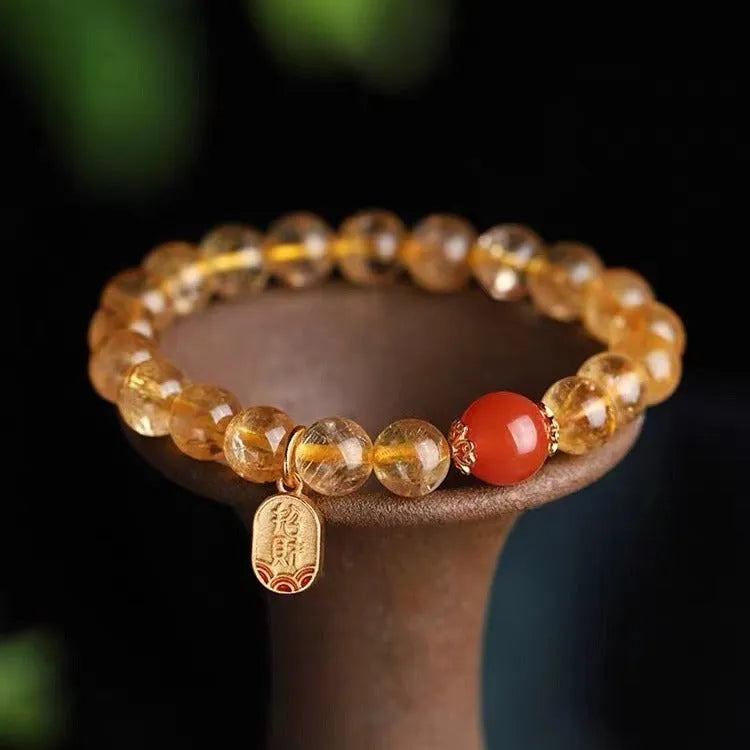 Natural red agate beaded bracelet with polished gold ruby spacers, shown in 6mm, 8mm, and 10mm bead size options.