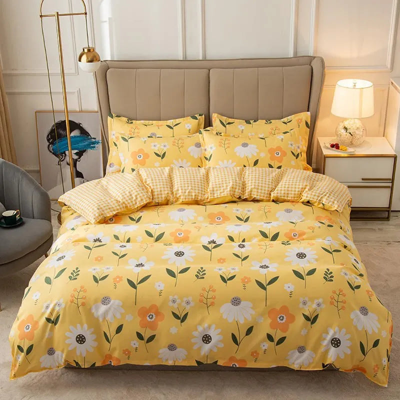 Cotton duvet cover and fitted sheet bedding set in a colour option, shown on a bed