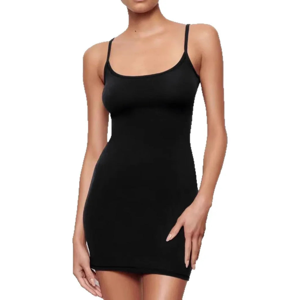 Black sleeveless sling dress with a skinny sheath fit and short skirt.