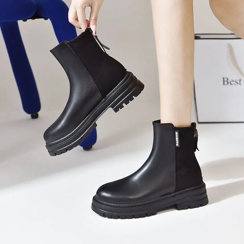 Large size women's platform Martin boots in solid black with rubber sole, low tube design