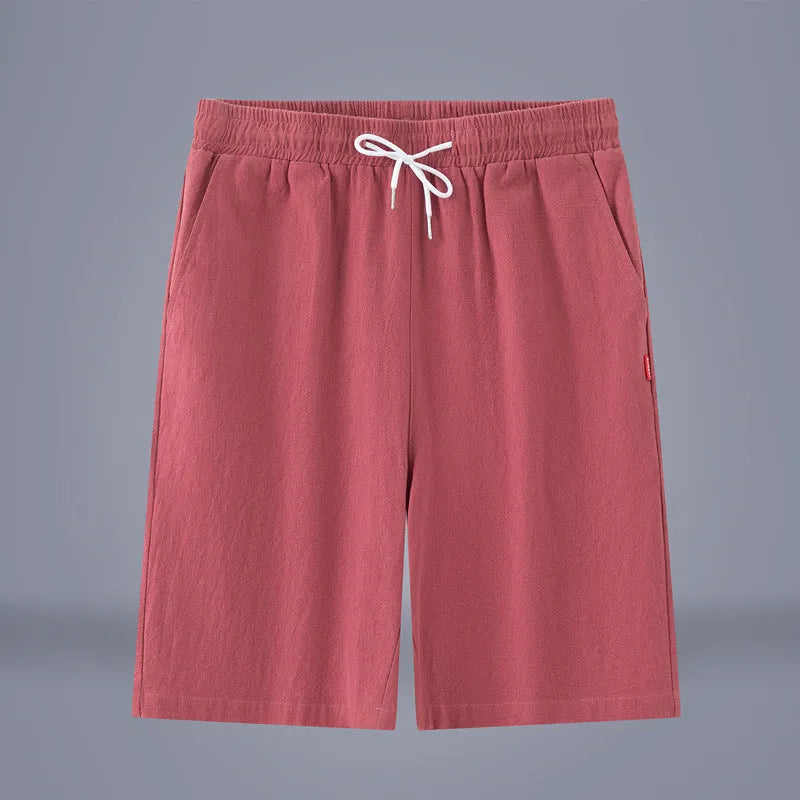 Chinese style solid colour cropped summer pants on a hanger.