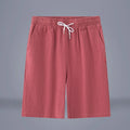 Chinese style solid colour cropped summer pants on a hanger.