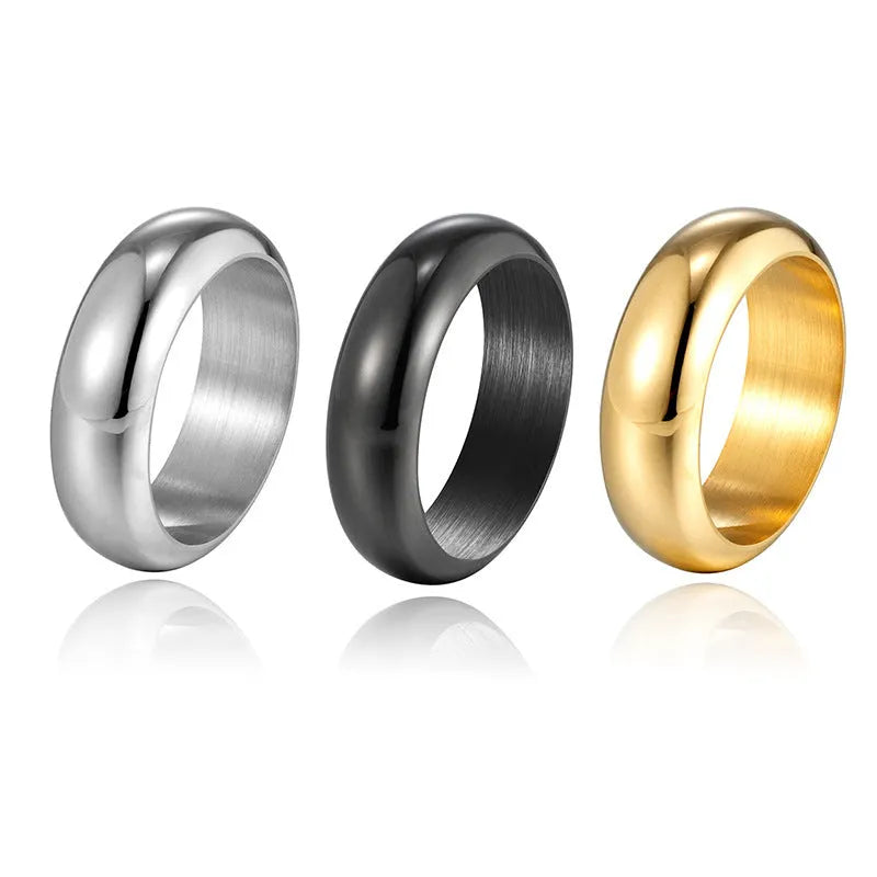 Glossy electroplated titanium steel ring shown in gold, black, and steel colour on a plain background.