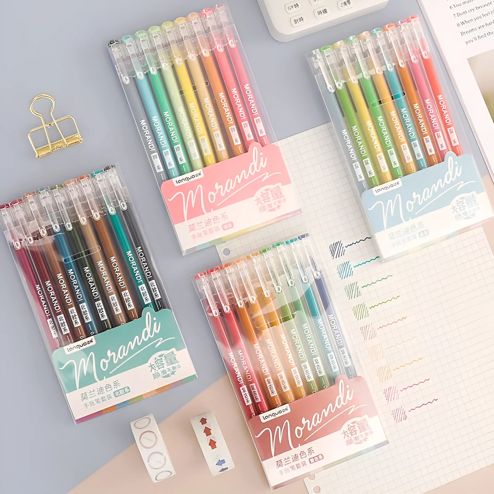 Set of nine gel pens with 0.5mm needle tips in a white plastic storage case.