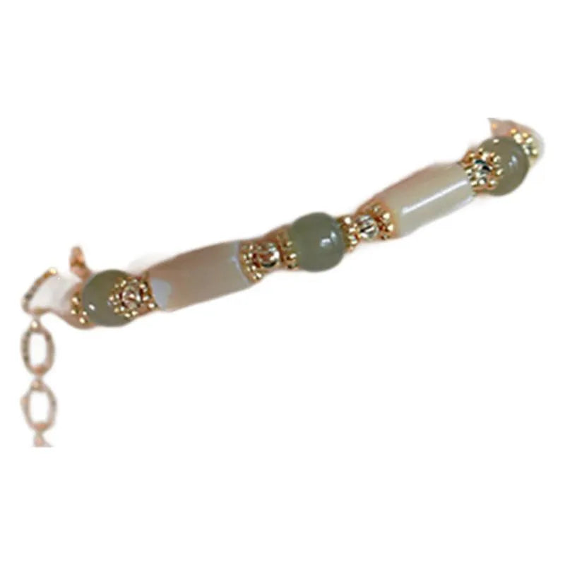 Women's Hetian jade white lip shell bracelet with round beads in simple geometric design