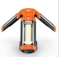 Retractable folding charging camping lantern in black orange with bracket and charging cable