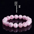 Grandmother crystal bracelet with polished purple geometry beads on a white background.