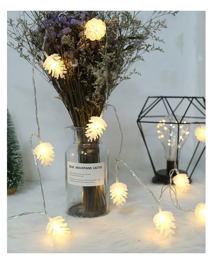 LED simulation transparent pine nut light string with PVC coating, showing multiple bulbs on a dark background