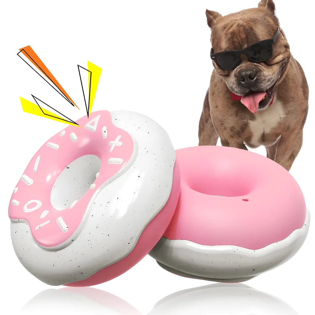Pink, yellow, and chocolate TPR donut dog toy with squeaker for molar cleaning.