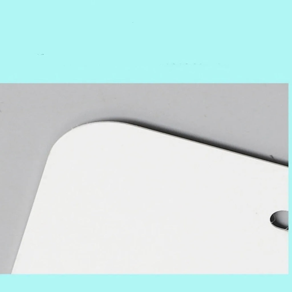 White aluminium licence plate sheet measuring 30.3 by 15 centimetres