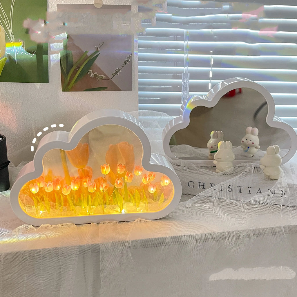 Pink DIY tulip night lamp with LED light and decorative mirror on a wooden desk.