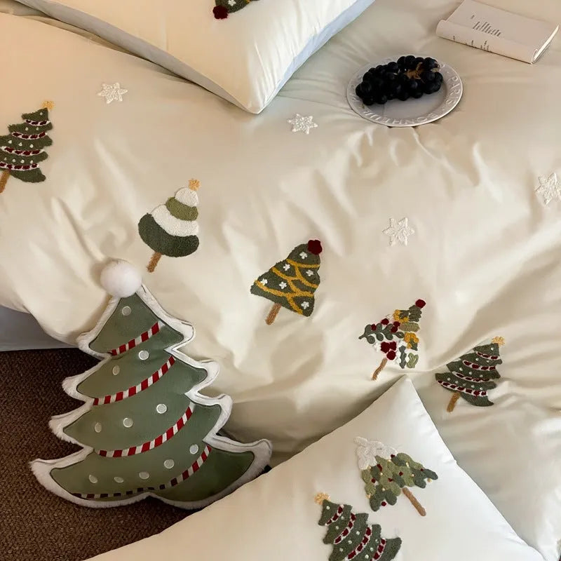 Cream blue duvet cover with embroidered Christmas tree and towel pattern, part of a pure cotton four-piece bedding set.