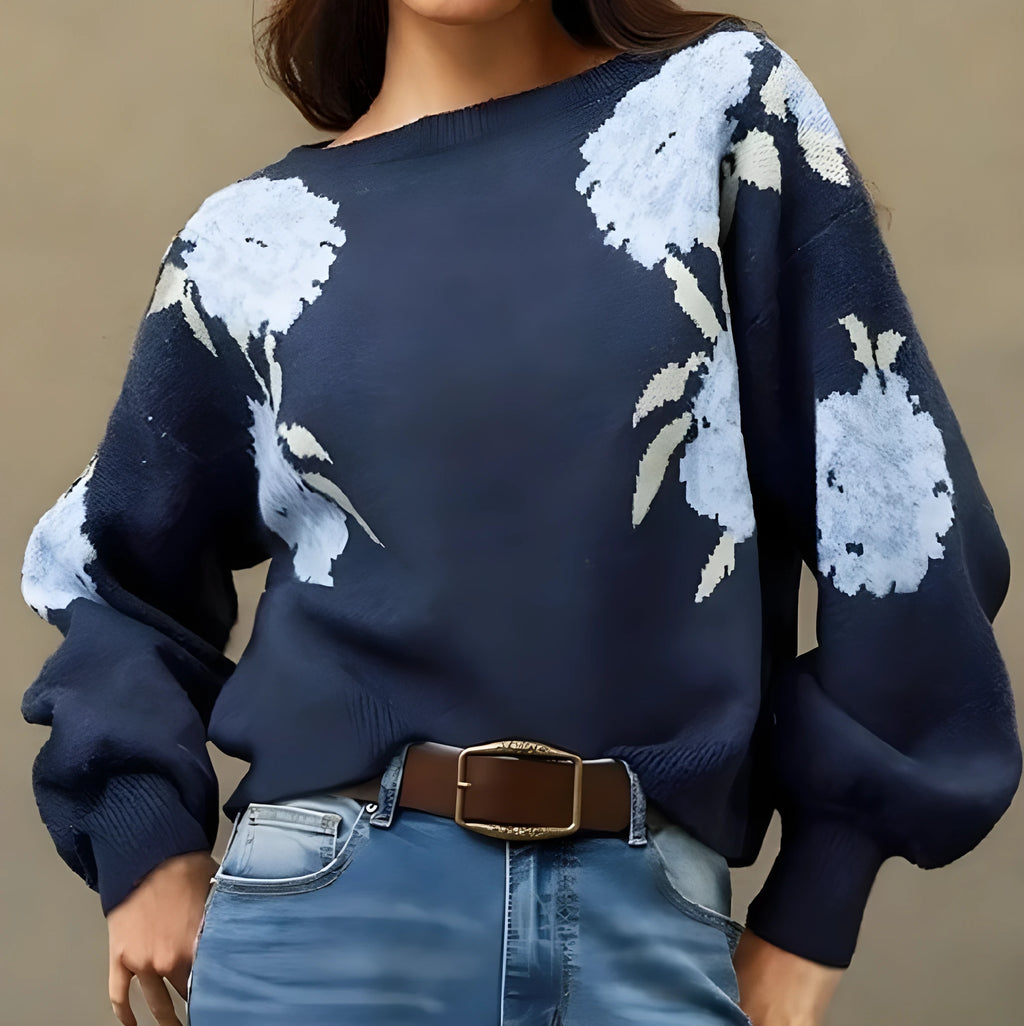Sapphire blue women's pullover with a loose fit and an all-over floral jacquard pattern.