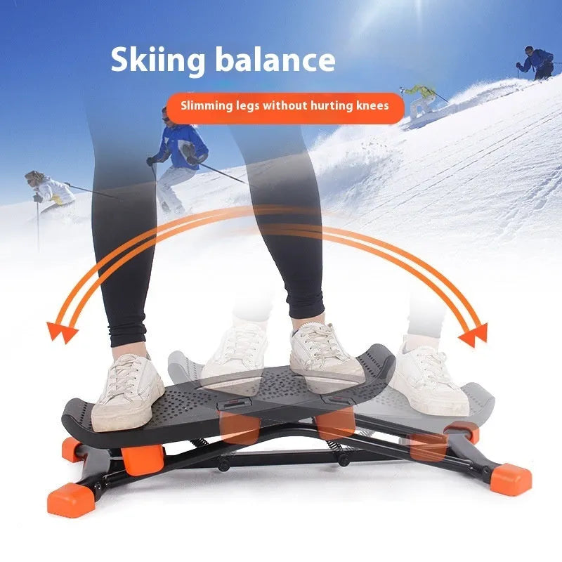 Black mini indoor skiing exercise machine with elastic hand straps, compact home cardio equipment.