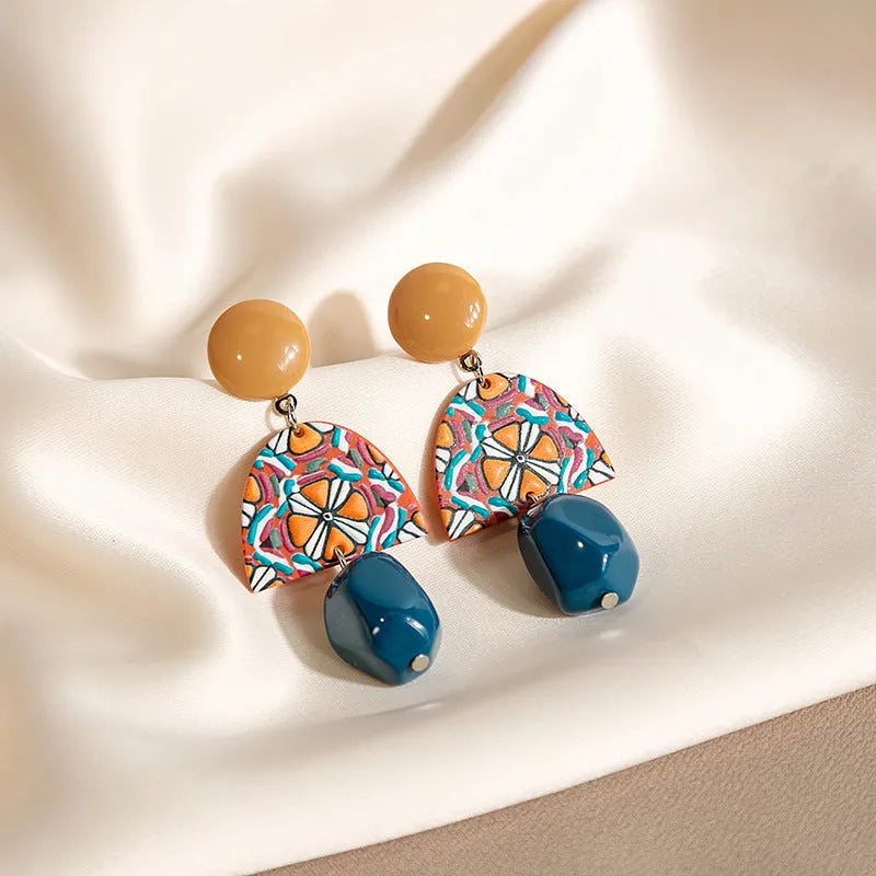 Retro yellow blue contrast acrylic earrings with irregular geometric shapes and electroplated finish