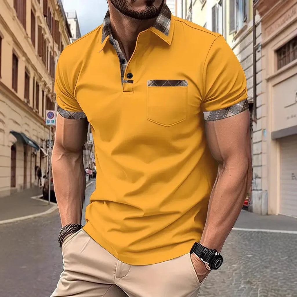 Man wearing a short sleeve plaid colourblock T-shirt with zipper detail on a white background.