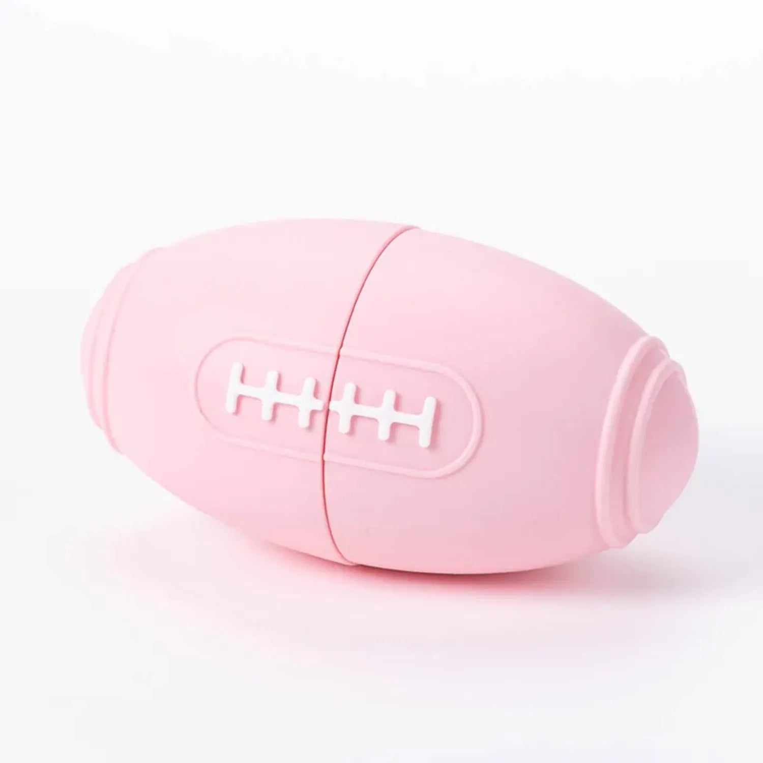 Blue silicone rugby ball shaped dog chew toy for boredom relief and interactive feeding.
