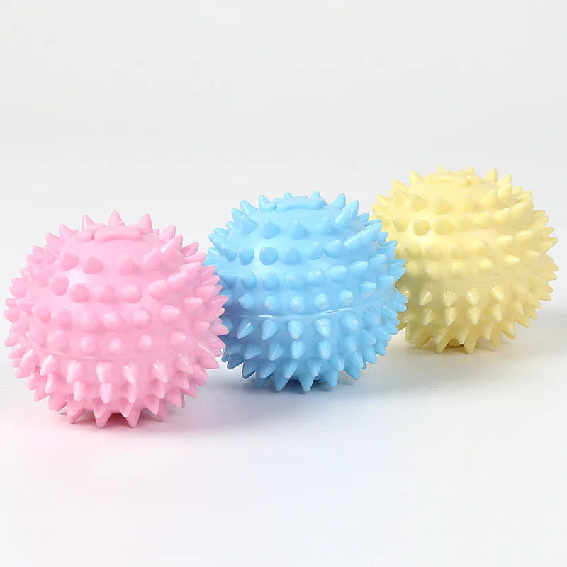 6cm blue TPR rubber dog chewing ball with textured footprint design for tooth cleaning