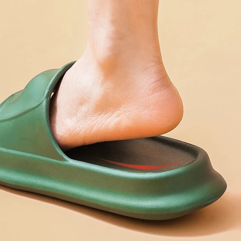 Pair of thick-soled white EVA flip-flop slippers with a non-slip patterned sole.