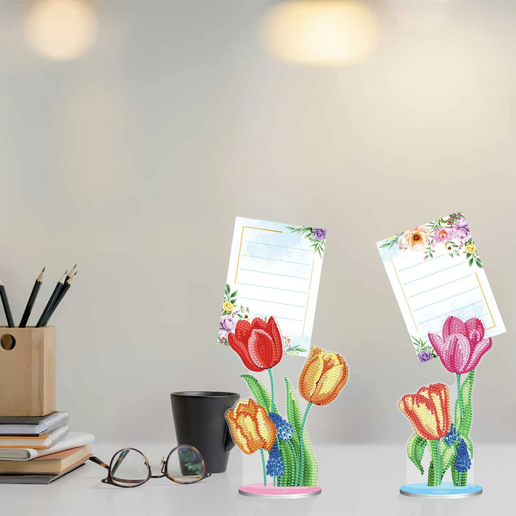 Handcrafted frameless diamond painting note clip desktop decoration on a wooden surface.