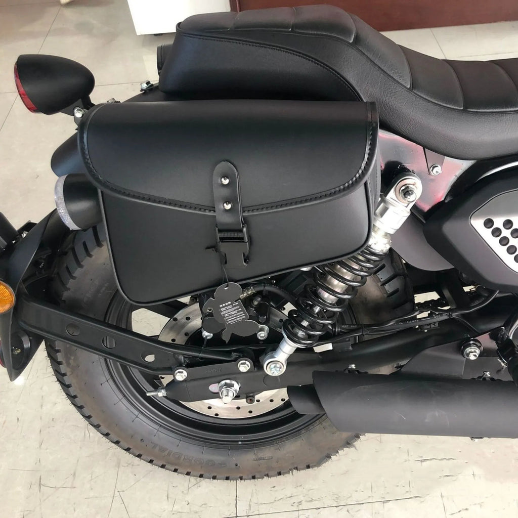 Black PU leather motorcycle swingarm bag mounted on bike showing dimensions and storage capacity