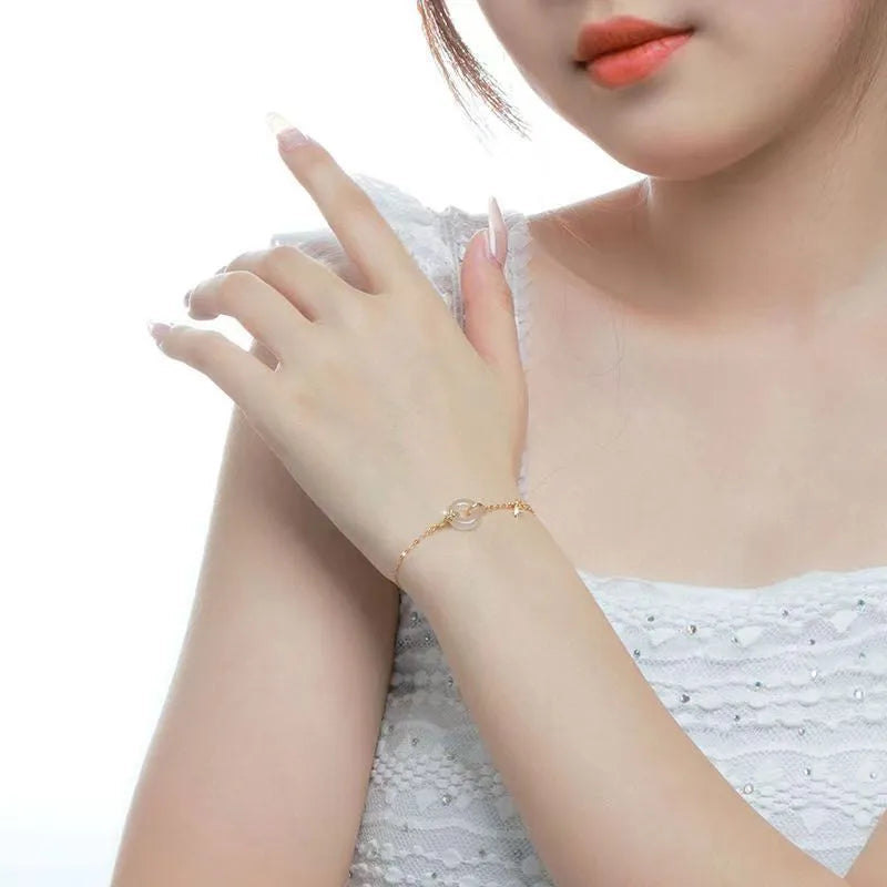 Silver gold electroplated women's bracelet with white chalcedony gemstone and starry sky design elements