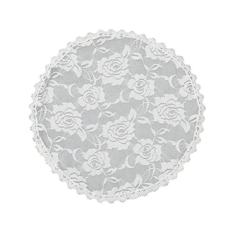Round wedding veil head covering with floral decoration in black or white colours measuring 30cm diameter