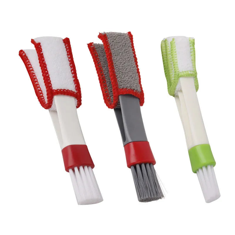 Multi functional double head gap brush for air conditioner slatted vent cleaning with green handle and superfine fibre bristles on white background