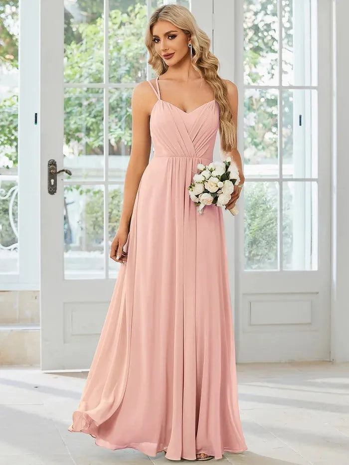 Women's long pleated sleeveless A-line dress in light green solid colour