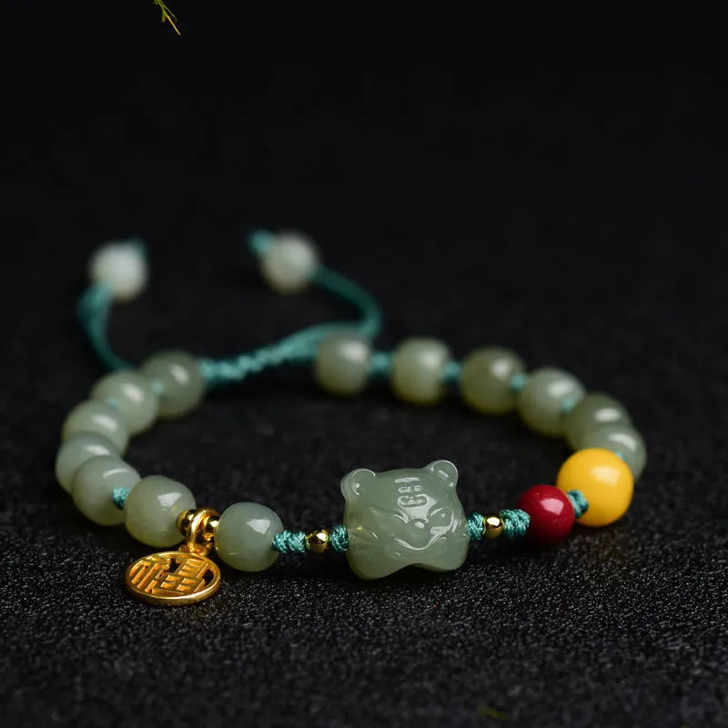 Natural Hetian Jade and cinnabar bracelet with beeswax beads and animal Zodiac charms