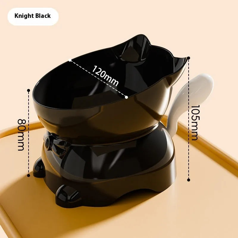 Slanted stainless steel cat bowl in blue with weighted silicone non-slip base on a wooden floor.