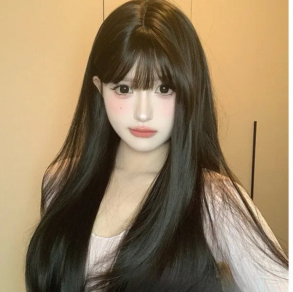 Dark brown synthetic long straight wig with fringe for women with round face shapes