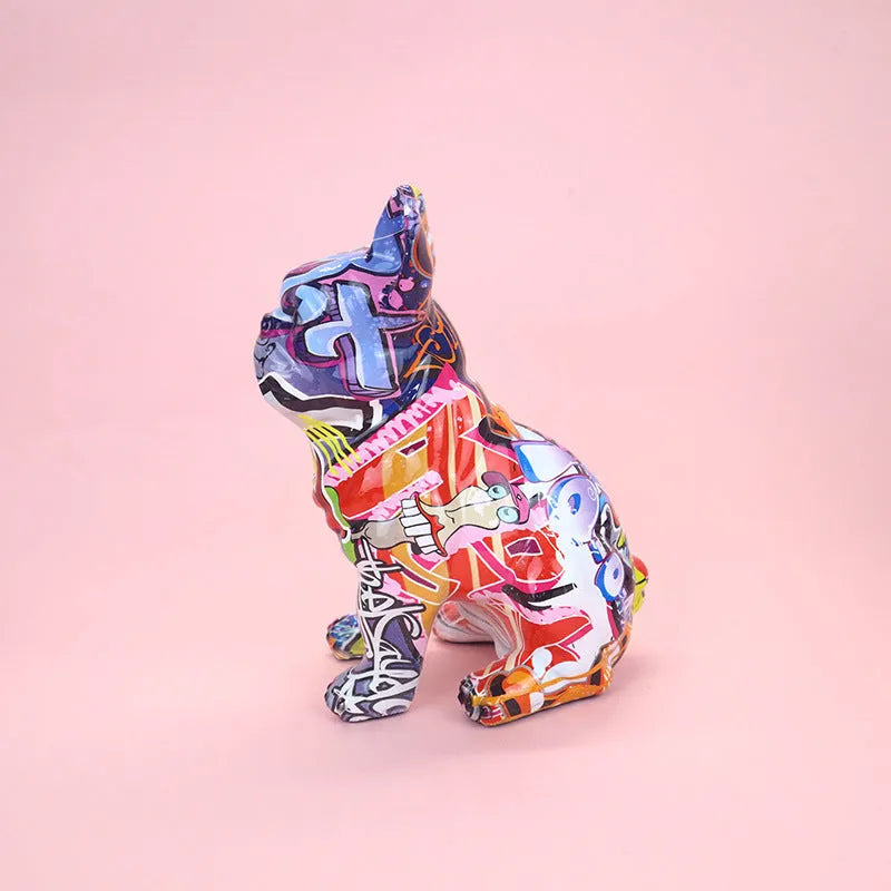 Graffiti finish resin French bulldog statue measuring 17cm in height on display surface