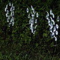 Solar-powered leaf branch garden light measuring 73cm tall with iron and plastic construction