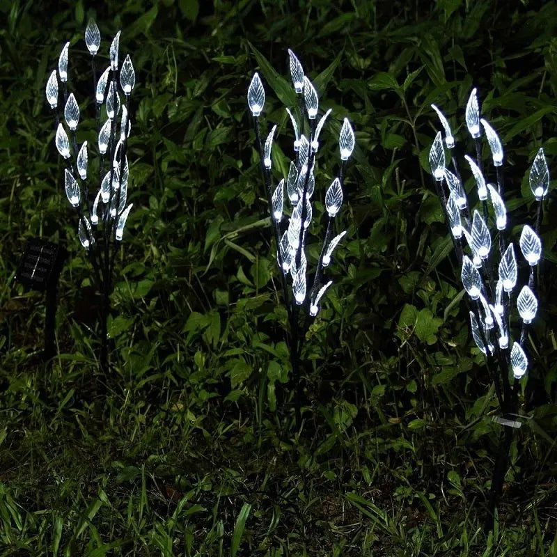 Solar-powered leaf branch garden light measuring 73cm tall with iron and plastic construction