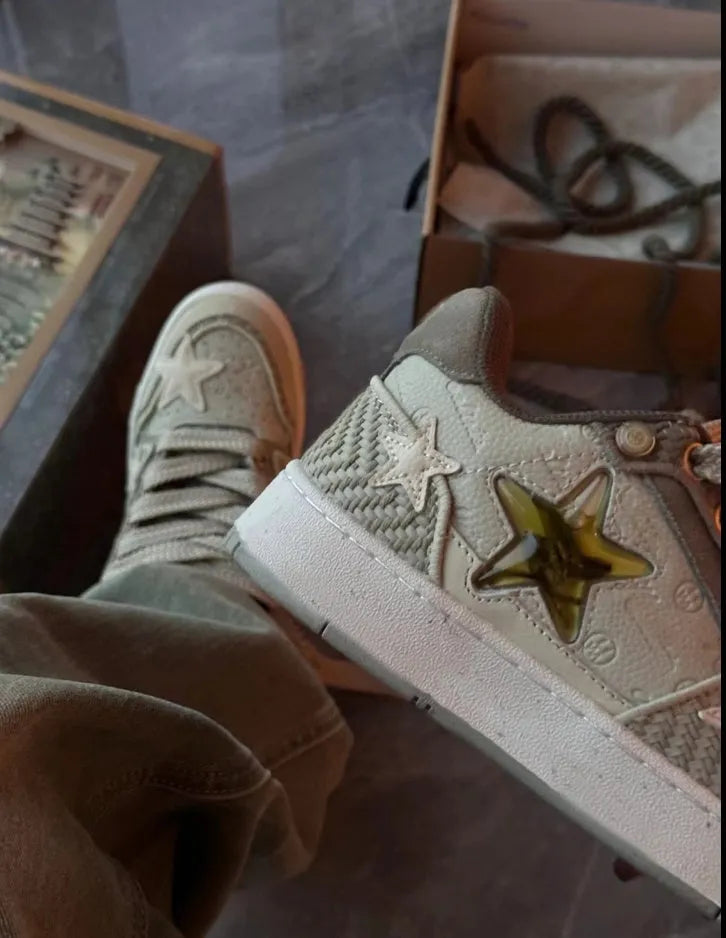 Green Small Crowd Original low-top sneakers with star pattern stitching and thick rubber sole on a white background.