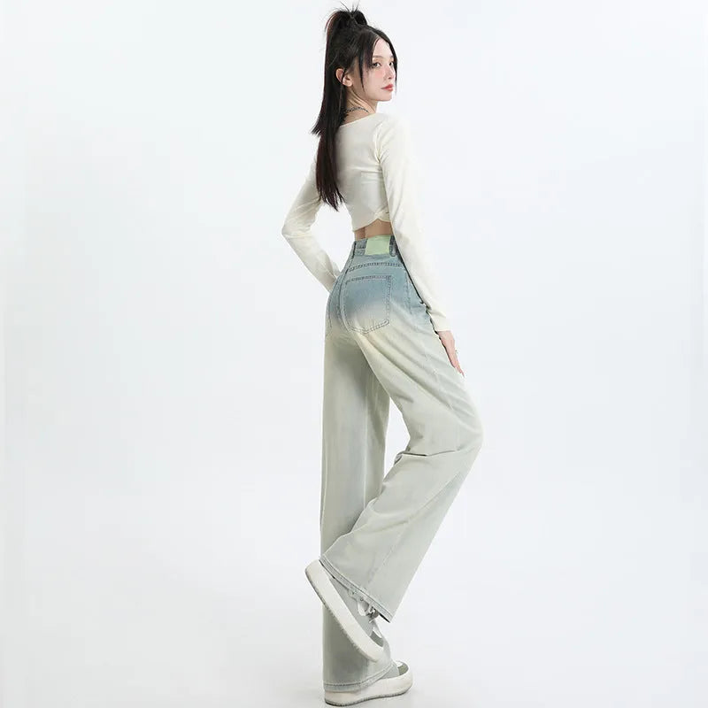Women's wide-leg straight-cut denim trousers in a gradient blue colour wash.