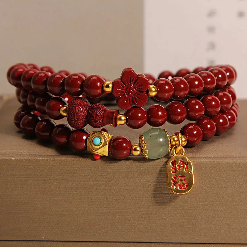 Women's multi-circle cinnabar bracelet with gourd and five petal flower design