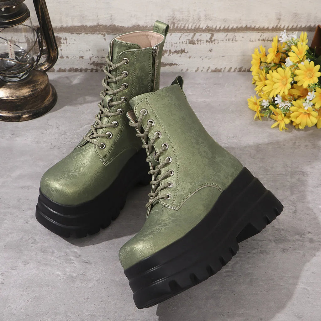 Women's black retro platform Martin boots with chunky heel and side zipper on a three-layer sole
