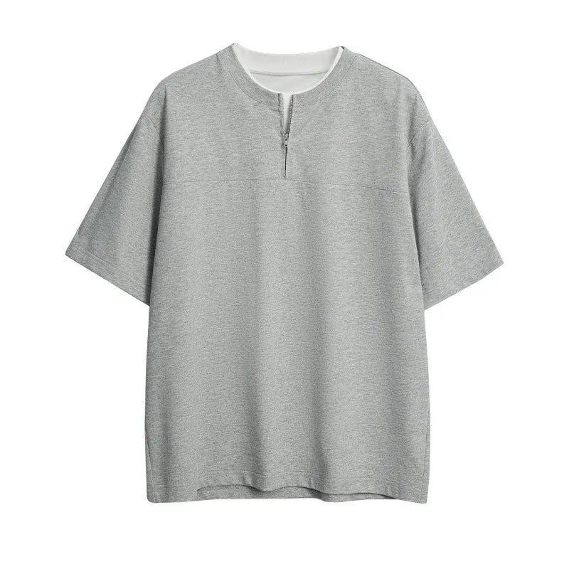 Loose solid colour pullover top with patchwork design and false zip detail in sapphire blue