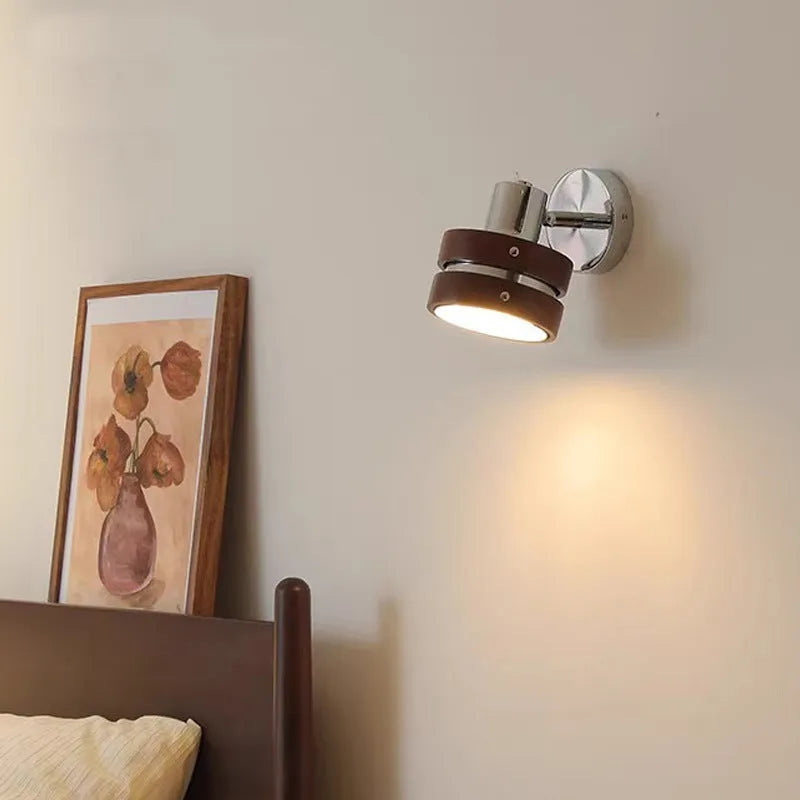 Nordic style walnut coloured indoor wall lamp for bedroom or hallway.