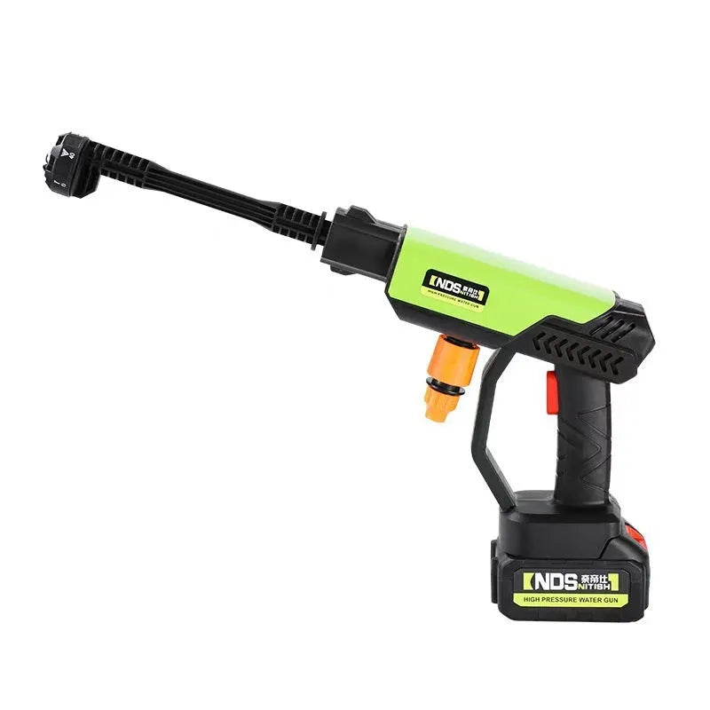 Green wireless high-pressure water gun with multiple nozzle attachments and accessories on a grey background