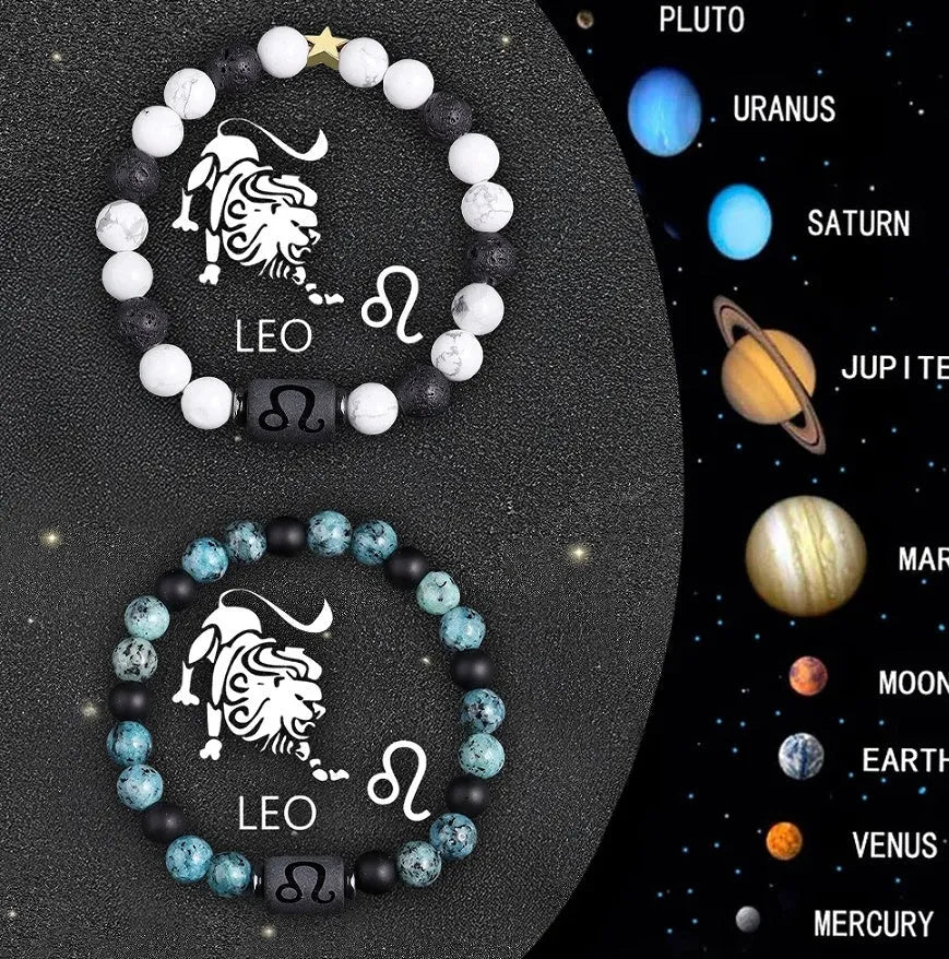 Set of two natural stone beaded bracelets with zodiac sign charms on a textured background.