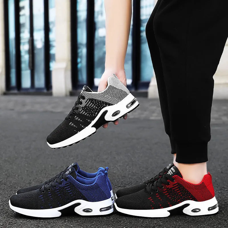 Men's low-top Flyknit mesh sneakers in black and blue colour, showcasing the lace-up design and round toe.