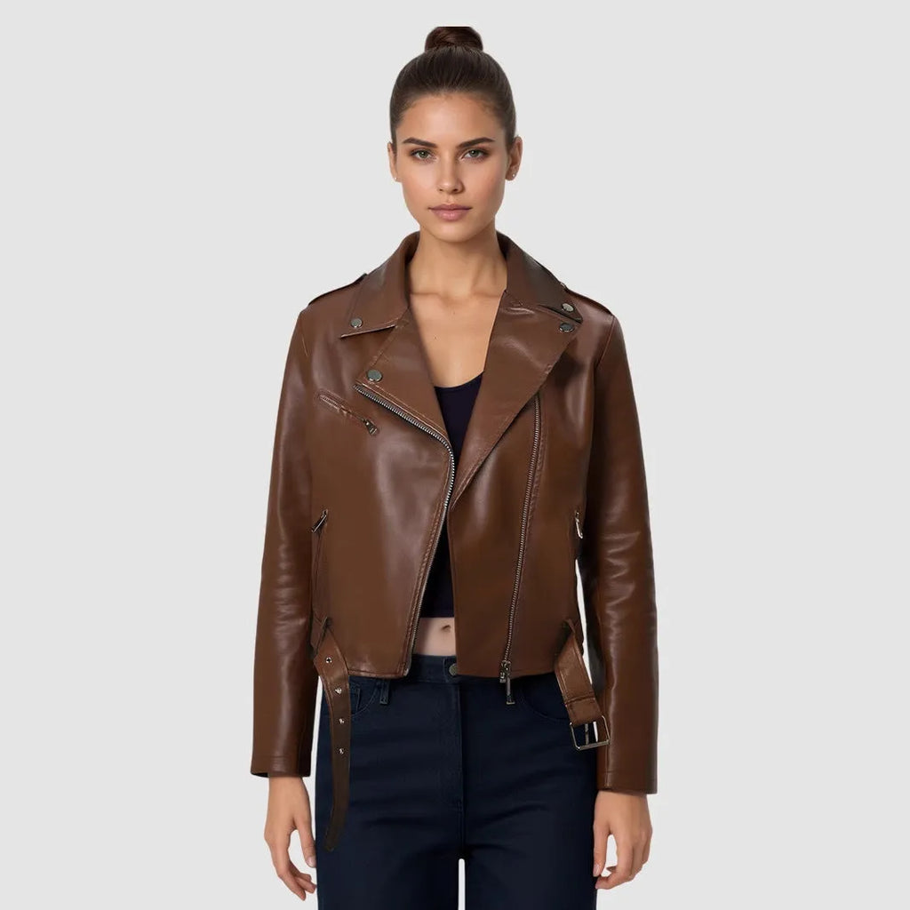 Women's short black PU leather biker jacket with an adjustable waist belt, shown on a model.